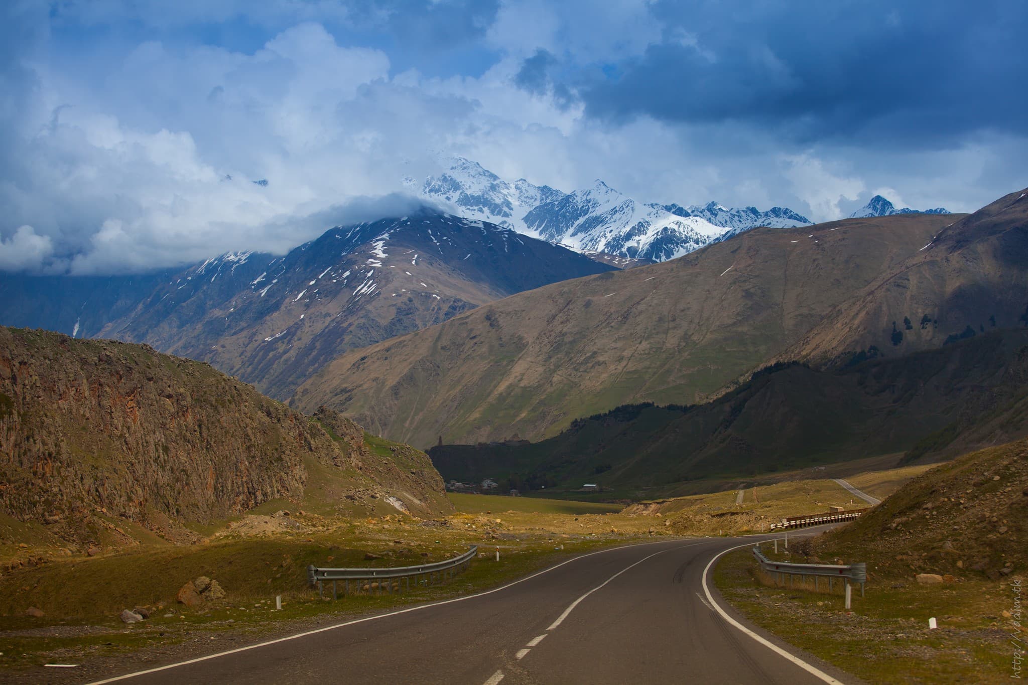 Georgian Military Road near Sioni and Stepantsminda, with mountains beyond.